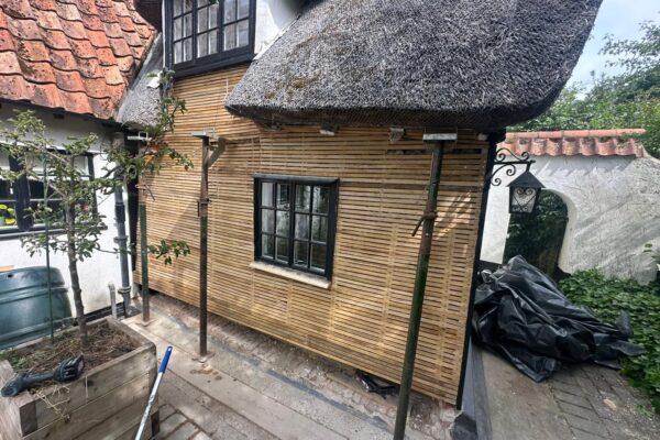 Elevation of thatched property with lathe wall